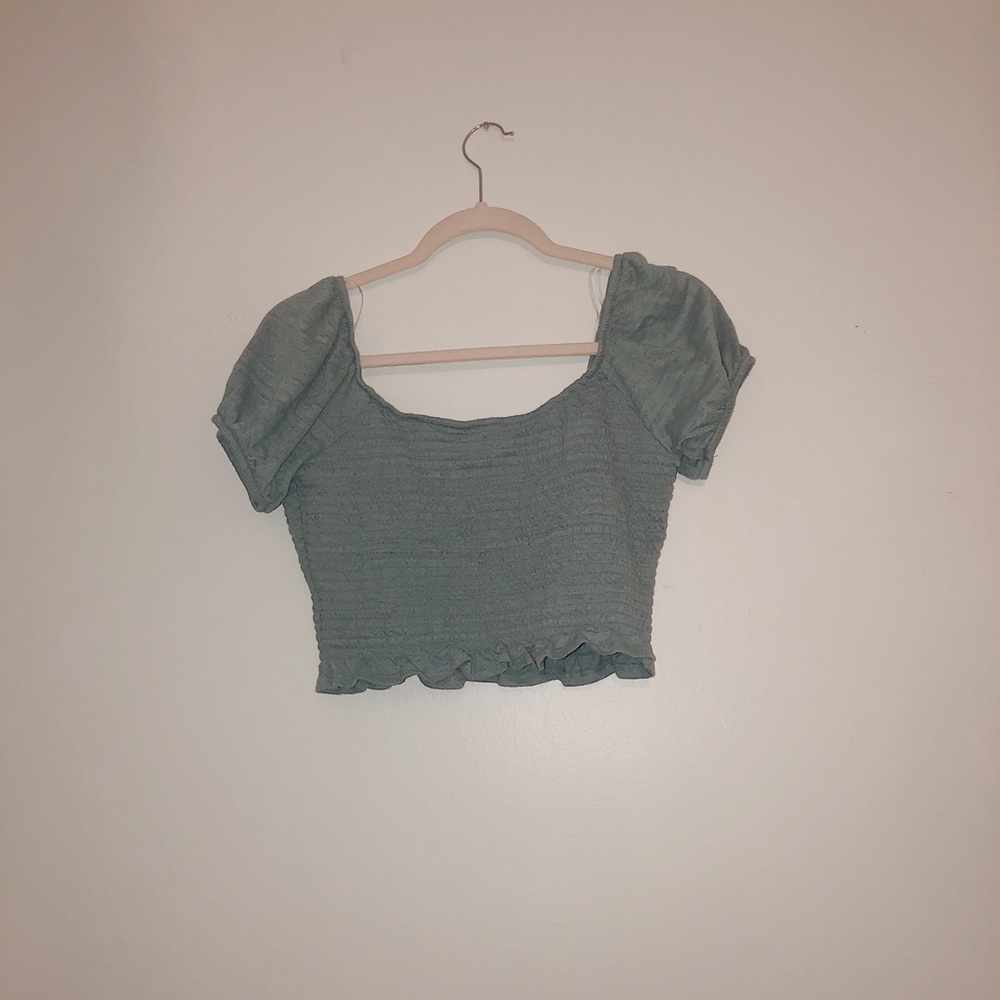Blue cropped shirt
